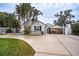 Charming single-story home with a covered carport and landscaped lawn at 524 Arneson Ave, Auburndale, FL 33823