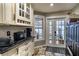 Kitchen with granite countertops and water views at 524 Arneson Ave, Auburndale, FL 33823