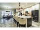 Bright kitchen with an island and lake view at 524 Arneson Ave, Auburndale, FL 33823