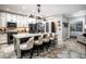 Open kitchen with island, breakfast nook, and ample storage at 524 Arneson Ave, Auburndale, FL 33823