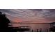 Sunset view over lake and dock at 524 Arneson Ave, Auburndale, FL 33823