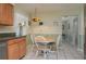 Bright dining area with a charming table and chairs at 615 E Haines Blvd, Lake Alfred, FL 33850