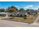 House exterior showcasing a well-maintained lawn at 615 E Haines Blvd, Lake Alfred, FL 33850