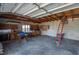 Spacious garage with workbench and storage cabinets at 615 E Haines Blvd, Lake Alfred, FL 33850