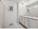 Clean bathroom with double vanity and shower/tub combo at 723 Chinoy Rd, Davenport, FL 33837