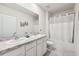 Modern bathroom with double sinks and a shower at 723 Chinoy Rd, Davenport, FL 33837