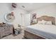 Cozy bedroom with wooden furniture and carpeted floor at 723 Chinoy Rd, Davenport, FL 33837