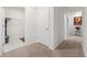 Shared hallway with laundry closet and linen closet at 723 Chinoy Rd, Davenport, FL 33837
