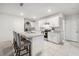 Spacious kitchen with white cabinets and granite countertops at 723 Chinoy Rd, Davenport, FL 33837