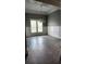 Formal dining room with elegant chandelier and wainscoting at 780 Waterfern Trail Dr, Auburndale, FL 33823