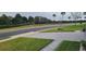Landscaped front yard with paver walkway and driveway at 780 Waterfern Trail Dr, Auburndale, FL 33823