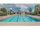 Inviting community lap pool perfect for recreation at 780 Waterfern Trail Dr, Auburndale, FL 33823