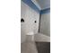 Spacious shower with built-in seat and gray tile at 780 Waterfern Trail Dr, Auburndale, FL 33823