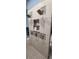 Large walk-in shower with double shower heads and built-in shelving at 780 Waterfern Trail Dr, Auburndale, FL 33823