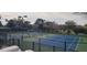 Well-maintained tennis courts are perfect for recreation at 780 Waterfern Trail Dr, Auburndale, FL 33823