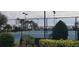Enjoy community tennis and basketball courts with scenic lake views at 780 Waterfern Trail Dr, Auburndale, FL 33823