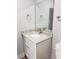 Bright bathroom vanity featuring granite countertop, chrome hardware, tile flooring, and neutral walls at 809 Lincoln St, Babson Park, FL 33827