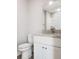 Close up of a bathroom vanity with granite countertop and modern fixtures at 809 Lincoln St, Babson Park, FL 33827