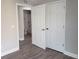 Bedroom view showing closet and bathroom access. Modern and functional design at 809 Lincoln St, Babson Park, FL 33827