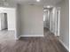 Bright hallway featuring recessed lighting and wood-look flooring throughout the home at 809 Lincoln St, Babson Park, FL 33827