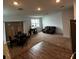 Dining area with table and chairs, near the kitchen and living room at 932 Grandin St, Davenport, FL 33837