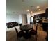 Modern kitchen with dark brown cabinets and stainless steel appliances at 932 Grandin St, Davenport, FL 33837