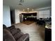 Living room with open concept kitchen and dining area at 932 Grandin St, Davenport, FL 33837