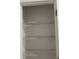 Empty pantry with three wire shelves at 932 Grandin St, Davenport, FL 33837