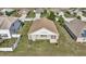 Aerial view of home and backyard at 1153 Legatto Loop, Dundee, FL 33838