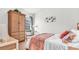 Cozy bedroom with a comfortable bed and built-in wardrobe at 1153 Legatto Loop, Dundee, FL 33838