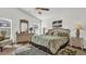 Bright bedroom with a king-size bed and matching furniture at 1153 Legatto Loop, Dundee, FL 33838