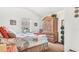 Spacious bedroom with a queen-size bed and ample closet space at 1153 Legatto Loop, Dundee, FL 33838