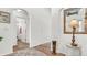 Entryway with view of bathroom and a patterned rug at 1153 Legatto Loop, Dundee, FL 33838