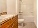 Simple bathroom with a tub shower combo at 124 A St, Haines City, FL 33844