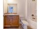 Clean bathroom, wood vanity, and a bathtub at 124 A St, Haines City, FL 33844