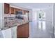 Modern kitchen with granite counters and stainless steel appliances at 124 A St, Haines City, FL 33844