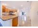 Kitchen with island and stainless steel appliances at 124 A St, Haines City, FL 33844