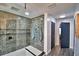 Modern bathroom with a large walk-in shower and gray tile at 1932 Southern Dunes Blvd, Haines City, FL 33844