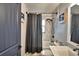 Bathroom with shower/tub combo and modern vanity at 1932 Southern Dunes Blvd, Haines City, FL 33844