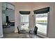 Breakfast nook with glass table and pool view at 1932 Southern Dunes Blvd, Haines City, FL 33844