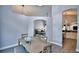 Bright dining room with view to living room and kitchen at 1932 Southern Dunes Blvd, Haines City, FL 33844