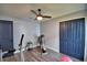 Home gym with exercise equipment and ceiling fan at 1932 Southern Dunes Blvd, Haines City, FL 33844