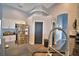 Modern kitchen with stainless steel appliances and granite countertop at 1932 Southern Dunes Blvd, Haines City, FL 33844
