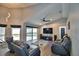 Spacious living room with vaulted ceilings, recessed lighting, and pool view at 1932 Southern Dunes Blvd, Haines City, FL 33844
