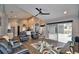 Bright and airy living room showcasing an open floor plan and pool access at 1932 Southern Dunes Blvd, Haines City, FL 33844