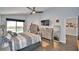 Main bedroom with sliding doors to the pool area at 1932 Southern Dunes Blvd, Haines City, FL 33844