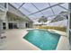 Large screened pool and deck with ample space for entertaining at 1932 Southern Dunes Blvd, Haines City, FL 33844