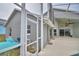 Screened-in pool area with adjacent patio at 1932 Southern Dunes Blvd, Haines City, FL 33844