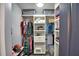 Large walk-in closet with ample shelving and hanging space at 1932 Southern Dunes Blvd, Haines City, FL 33844