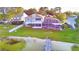 House with private dock, lake access, and lush green lawn at 2119 Kirkland Lake Dr, Auburndale, FL 33823